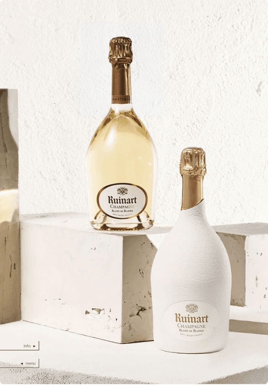 Butelki szampana Ruinart Blanc de Blancs